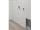Laundry area with vinyl flooring, hookups and storage at 3826 N Elk St, Aurora, CO 80019