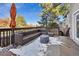 Outdoor deck with comfortable seating arrangement and privacy fence at 2067 E Phillips Pl, Centennial, CO 80122