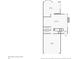 Floor plan of the first floor of the house highlighting the kitchen, living room, and garage at 2067 E Phillips Pl, Centennial, CO 80122
