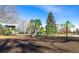 Colorful playground set with slides and climbing equipment in a park setting for children to enjoy at 2067 E Phillips Pl, Centennial, CO 80122