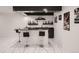 Stylish bar area with floating shelves and modern black bar stools at 29780 E 162Nd Ave, Brighton, CO 80603