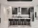 Well-appointed kitchen features black cabinets, stainless steel appliances, and a central island at 29780 E 162Nd Ave, Brighton, CO 80603