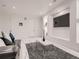 Modern living space with unique wall niches and sleek marble-look floors at 29780 E 162Nd Ave, Brighton, CO 80603