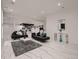 Modern living room with sleek black sofas, accent pillows, stylish bar, and white marble floors at 29780 E 162Nd Ave, Brighton, CO 80603