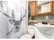 Bathroom with unique decor featuring a novelty shower curtain at 85 Revett Dr # 15, Breckenridge, CO 80424