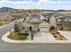 Aerial view of the house showcasing its location in a neighborhood with mountain views at 6013 Eldora St, Golden, CO 80403