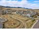 Picturesque view of a vibrant residential neighborhood, boasting a mix of modern homes and scenic natural surroundings at 6013 Eldora St, Golden, CO 80403