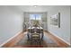 Formal dining room with a large window, stylish table, and elegant decor at 6013 Eldora St, Golden, CO 80403