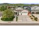 Beautiful home with a two-car garage, well maintained lawn, and excellent curb appeal at 6013 Eldora St, Golden, CO 80403