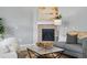 Stylish fireplace with stone accents creates a warm and inviting atmosphere at 6013 Eldora St, Golden, CO 80403