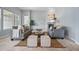 Comfortable living room with stylish furniture and a cozy fireplace at 6013 Eldora St, Golden, CO 80403