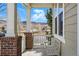 Cozy front porch with seating offers mountain views at 6013 Eldora St, Golden, CO 80403