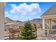 Beautiful neighborhood with well-maintained homes, mature trees, and mountain views in the distance at 6013 Eldora St, Golden, CO 80403