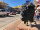 Street view featuring a bison statue in front of buildings on a sunny day in downtown at 6013 Eldora St, Golden, CO 80403