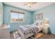 Comfortable bedroom featuring soothing colors, natural light, and a cozy atmosphere at 20535 E 47Th Ave, Denver, CO 80249