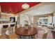 Open-concept living space featuring a kitchen, dining area, living room, and staircase at 20535 E 47Th Ave, Denver, CO 80249