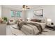 A bright bedroom with large bed and a sunlit window creating a relaxing space at 585 S Alton Way # 6B, Denver, CO 80247