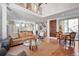 Bright, open-concept living space featuring modern decor, hardwood floors, and ample natural light at 4514 W 34Th Ave, Denver, CO 80212