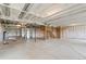 Unfinished basement with concrete floors and exposed framing and utilities at 1904 Water Birch Way, Castle Rock, CO 80108