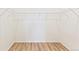 Empty walk-in closet with wood-look flooring and wire shelving at 1904 Water Birch Way, Castle Rock, CO 80108