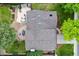 Overhead view of the home's roof, backyard patio with outdoor seating, landscaping and lawn at 11035 E Berry Ave, Englewood, CO 80111
