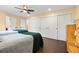 Spacious bedroom features hardwood floors and ample closet space at 11035 E Berry Ave, Englewood, CO 80111