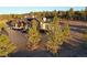 Modern home on a large lot with mature trees at 1571 Arrowpoint Ct, Franktown, CO 80116