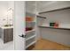 Large walk-in closet with ample shelving and hanging space at 1571 Arrowpoint Ct, Franktown, CO 80116