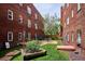 Private courtyard with lush landscaping and outdoor seating at 1351 N Washington St # 23, Denver, CO 80203