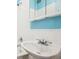 Bright bathroom featuring white tile, sink and vanity, with good natural light at 1351 N Washington St # 23, Denver, CO 80203