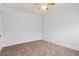 Clean, unfurnished bedroom with ceiling fan and neutral walls at 1351 N Washington St # 23, Denver, CO 80203