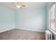 Bright bedroom with large window and ample space for furnishings at 1351 N Washington St # 23, Denver, CO 80203