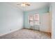 Well-lit bedroom featuring a radiator and a window at 1351 N Washington St # 23, Denver, CO 80203