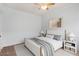 Cozy bedroom featuring plush carpet, ceiling fan, and neutral decor at 1351 N Washington St # 23, Denver, CO 80203