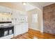 Cozy kitchen with tile backsplash and bright natural light at 1351 N Washington St # 23, Denver, CO 80203