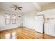 Open floorplan with hardwood floors, exposed brick, and bright kitchen at 1351 N Washington St # 23, Denver, CO 80203