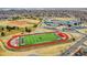 A school with baseball and football fields nearby promotes community engagement and Gathering activities in the neighborhood at 14425 E 50Th Ave, Denver, CO 80239