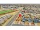 This home is located near a school with a track and football field, convenient for families valuing education and athletics at 14425 E 50Th Ave, Denver, CO 80239