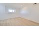 Bright, updated room with modern floors and recessed lighting at 9955 Fillmore St, Thornton, CO 80229