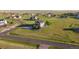 Scenic aerial perspective of a home with an expansive yard in a quiet residential community at 881 Kirby Ct, Watkins, CO 80137