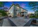 Spacious backyard featuring a large patio perfect for outdoor entertaining and relaxation at 881 Kirby Ct, Watkins, CO 80137
