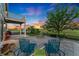 Inviting patio area with comfortable seating, ideal for enjoying sunsets and outdoor living at 881 Kirby Ct, Watkins, CO 80137