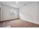 Spacious unfinished basement with carpeted floors at 8791 Yellowcress St, Littleton, CO 80125