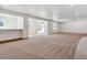 Open concept basement with lots of natural light at 8791 Yellowcress St, Littleton, CO 80125