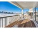 Spacious deck with wood flooring and snowy landscape views at 8791 Yellowcress St, Littleton, CO 80125