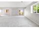 Spacious basement area with lots of natural light and a sliding glass door to the backyard at 4519 Silver Mountain Loop, Broomfield, CO 80023