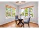 Charming breakfast nook with large windows, offering scenic views and natural light at 4519 Silver Mountain Loop, Broomfield, CO 80023