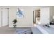 Relaxing main bedroom featuring ensuite bathroom with bathtub and glass-enclosed shower at 4519 Silver Mountain Loop, Broomfield, CO 80023