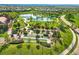 Overhead view of the park featuring green lawns, a pond, and walking paths at 4519 Silver Mountain Loop, Broomfield, CO 80023