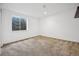 Spacious finished basement room with neutral carpeting at 10360 E Jewell Ave # 95, Aurora, CO 80247